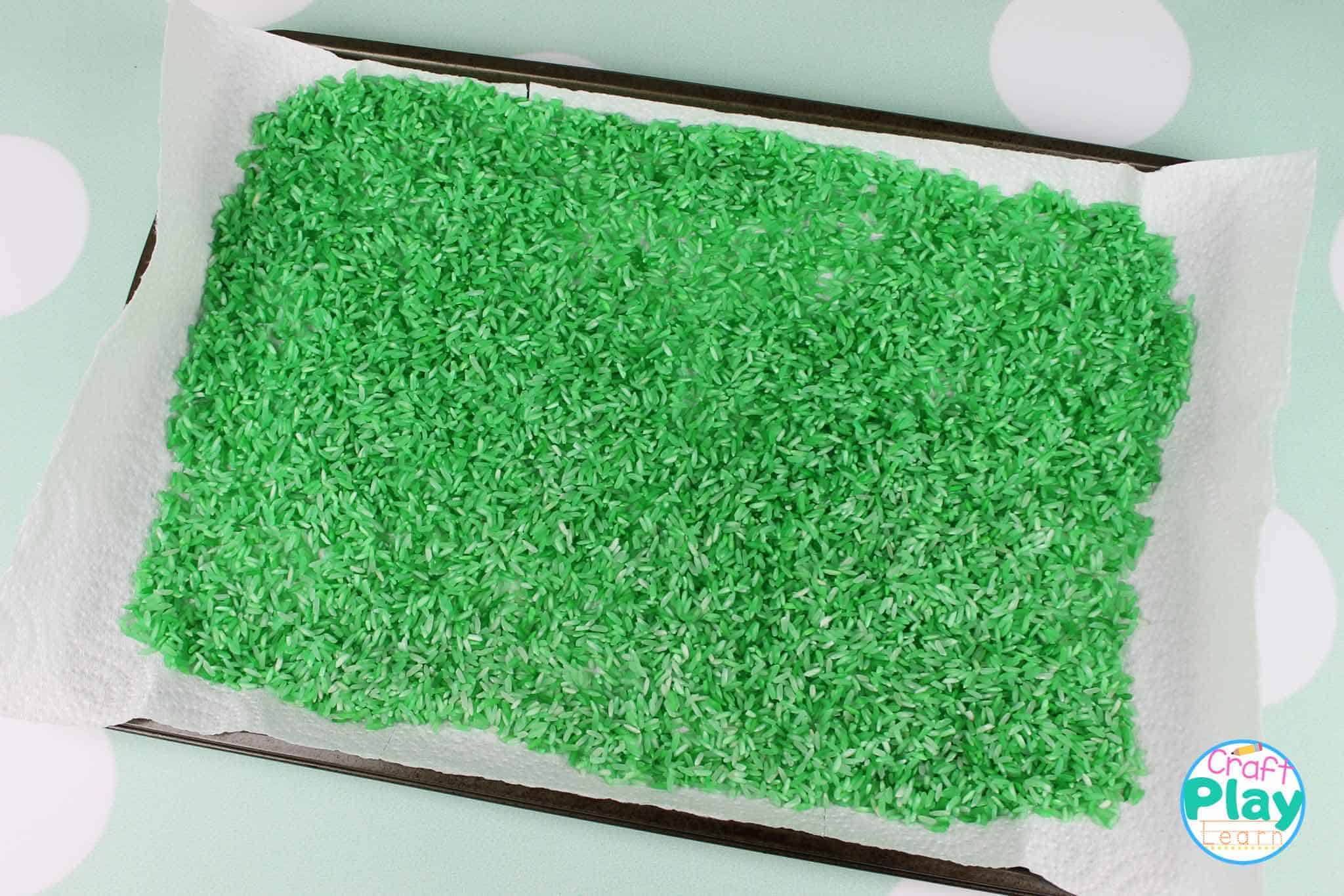 DIY Dinosaur Rice Sensory Bin - Craft Play Learn