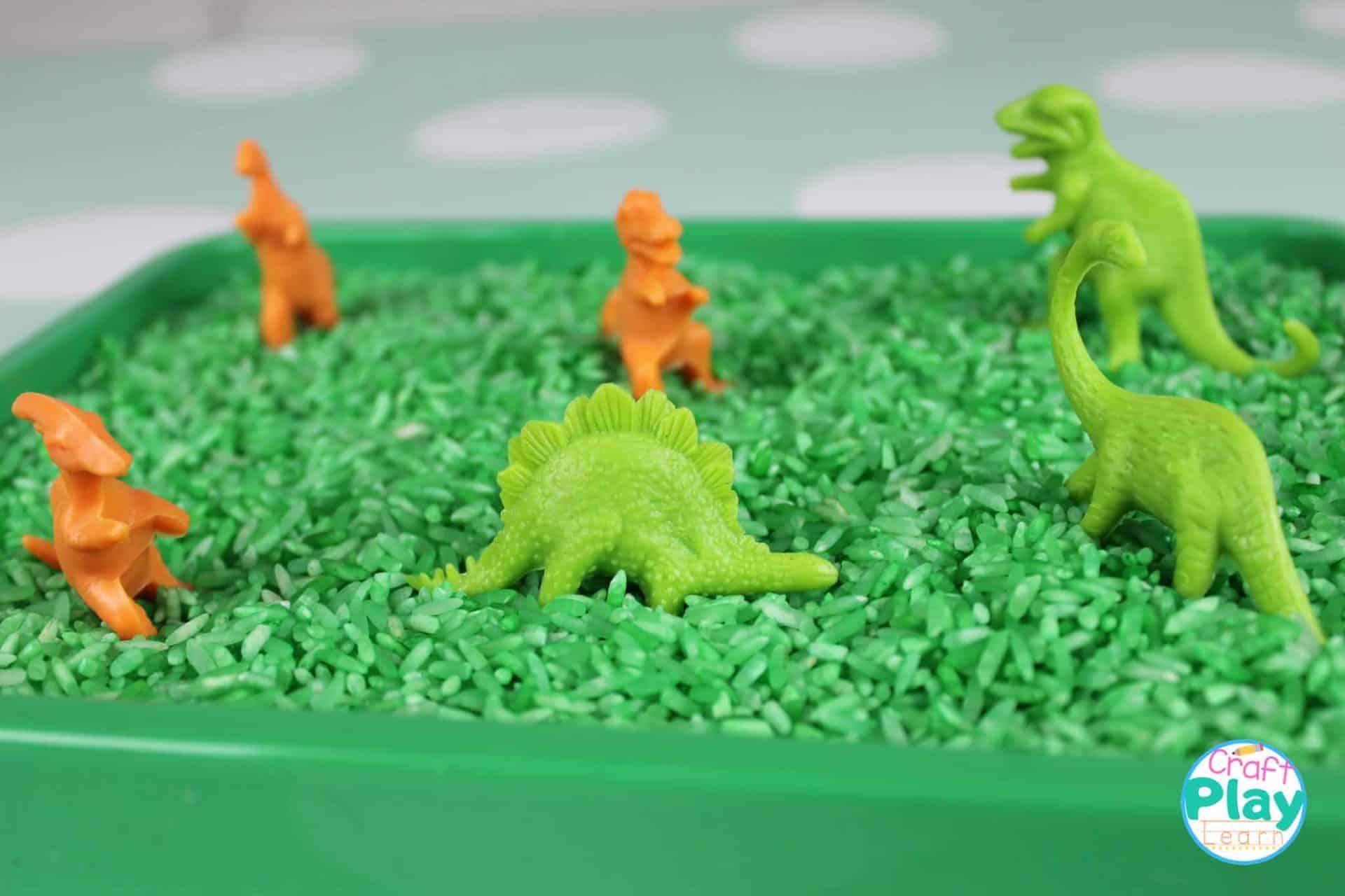 DIY Dinosaur Rice Sensory Bin - Craft Play Learn