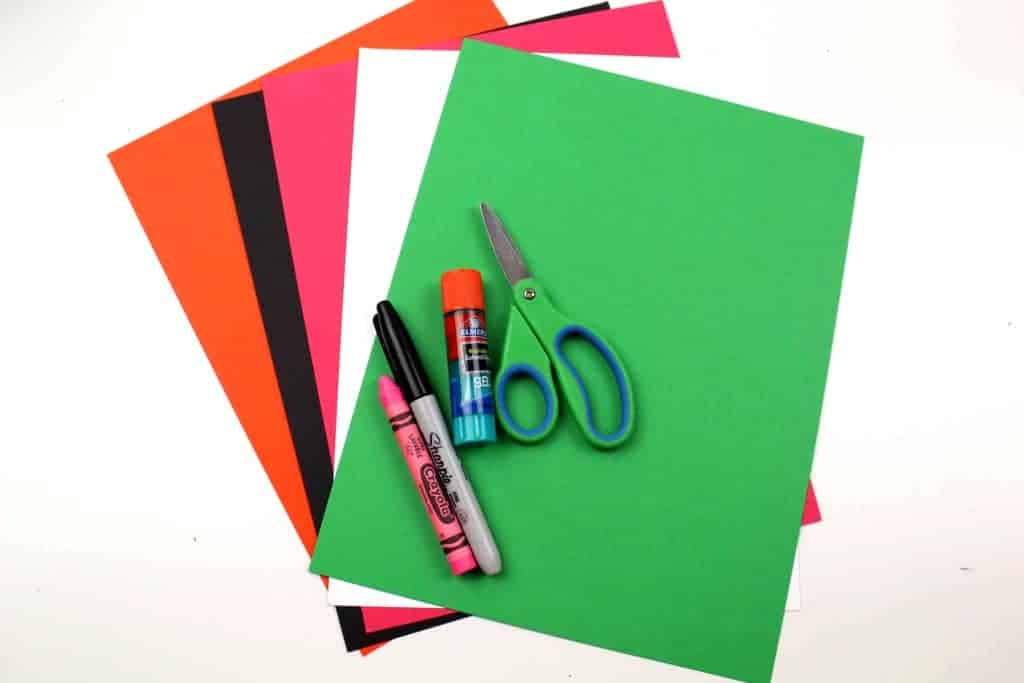 supplies needed for paper penguin craft with accordion legs