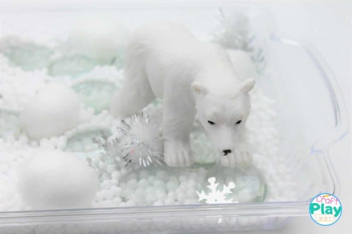 adding polar bear to sensory bin for preschool kids adding polar bear to sensory bin for preschool kids