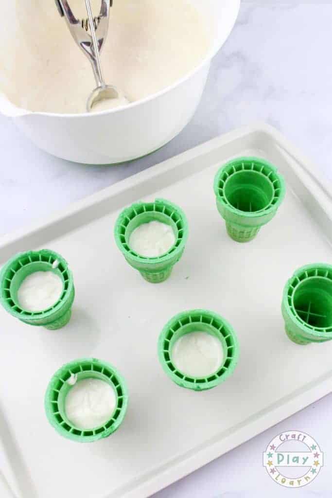 making green eggs and ham batter for dr seuss cupcakes