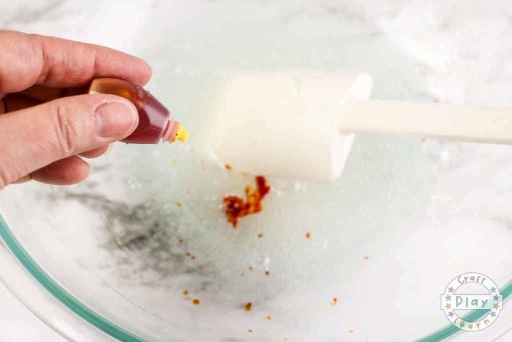 adding dye to slime