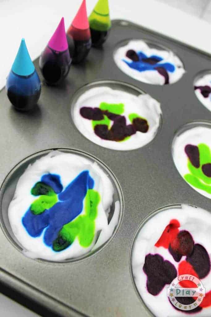 mix dye using tooth pick to dye eggs with shaving foam
